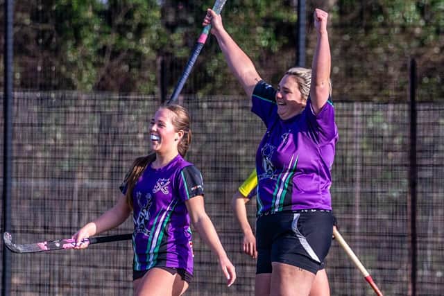 Danby's Katie Hodgson (arms raised) celebrates her goal with Lily Harland. Photo by Brian Murfield