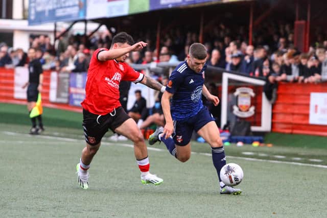 Defender Alex Brown pushes on for the Seadogs at Tamworth.
