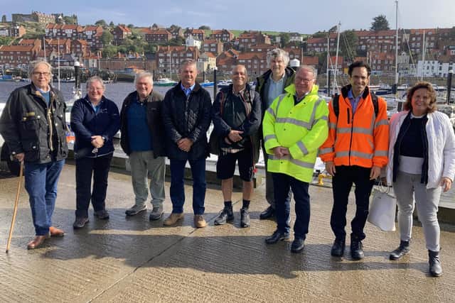 From left: Couns David Chance, Heather Phillips, Clive Pearson, Malcolm Taylor, Subash Sharma, Neil Swannick, Bryn Griffiths, George Jabbour and Heather Moorhouse in Whitby.