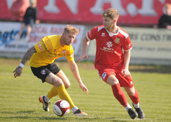 Jake Martindale's brace helped Brid Town avoid a shock exit in the first round of the Senior Cup.