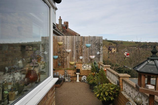 A top tier patio area with country vista.