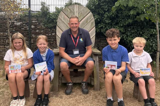 Postcard competitors, L-R, Emily, Hattie, St Helen’s site manager Simon Roe, Charlie and Wilfred.