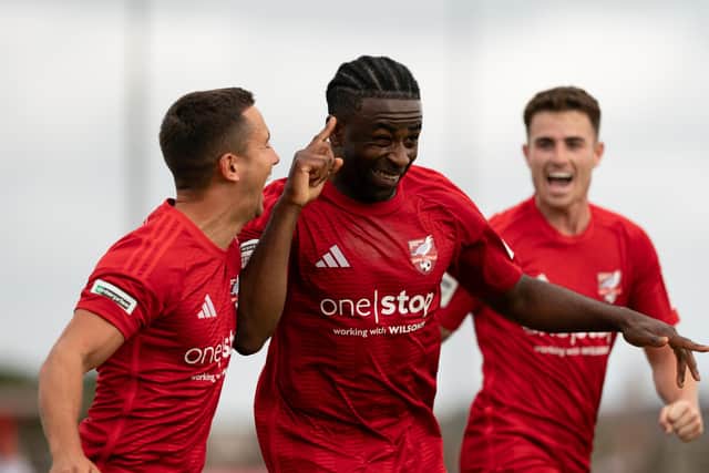 Kieran Weledji celebrates with Lewis Maloney and Dom Tear after scoring the late winner in the opening home game of the season against AFC Fylde. Photo by Wandering Photography