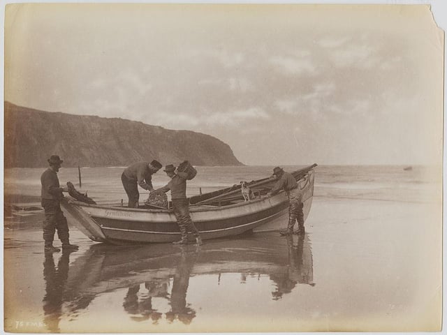 The Storm family of Robin Hood's Bay, Whitby, North Yorkshire, circa 1895. They are Thomas, Reuben, Mathew, Spy the dog and Issac, a farmer who is also cox of the lifeboat. (Photo by Frank Meadow Sutcliffe/Hulton Archive/Getty Images)