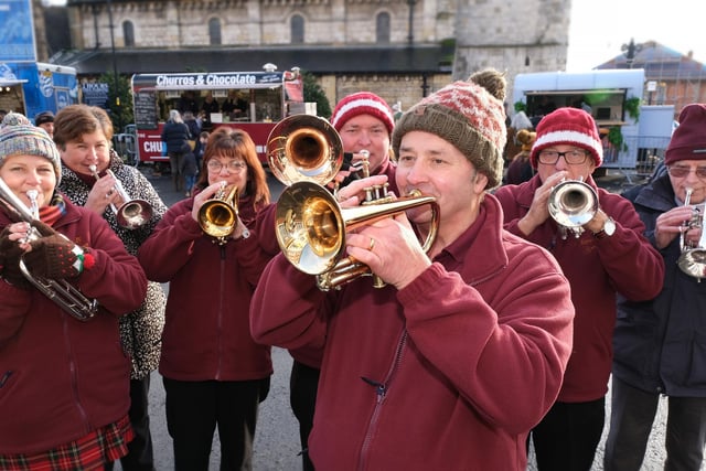 Brass band musicians fill the streets with music.
picture: Richard Ponter
