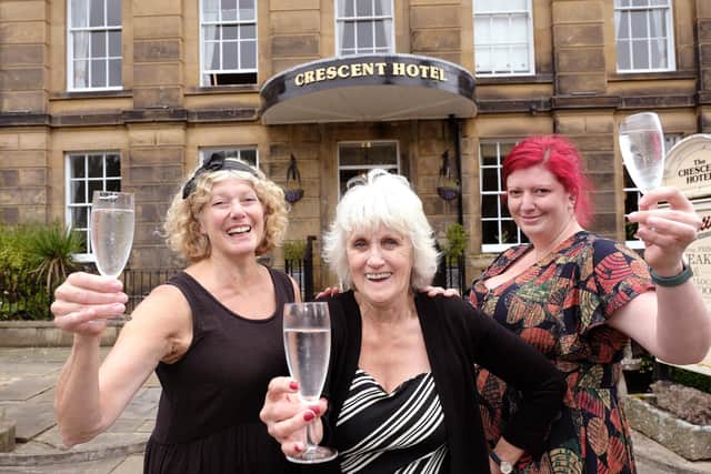 Cheers to Denise Horbury, centre, with the Crescent Hotel owner Sadie Shard and, left, her mum Morag