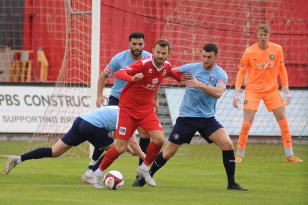 Lewis Dennison scored a penalty as Brid Town battled back from 2-0 down to win 3-2 at Grantham on Saturday, but was then sent off for a second caution in stoppage-time.