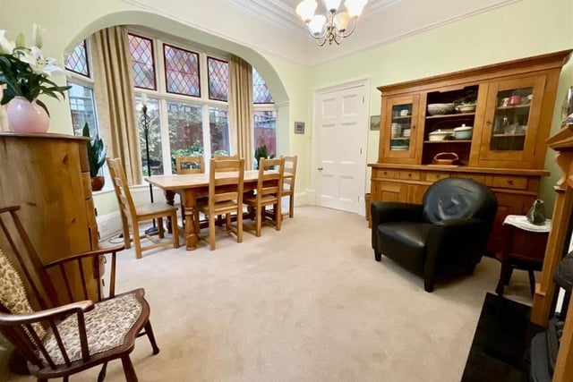 The spacious dining room also has the advantage of a feature bay window.