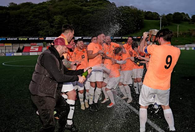 Edgehill celebrate winning their fifth and final trophy of the 2022-23 season, the District FA Cup, after beating Whitby Fishermen. Photo by Richard Ponter.