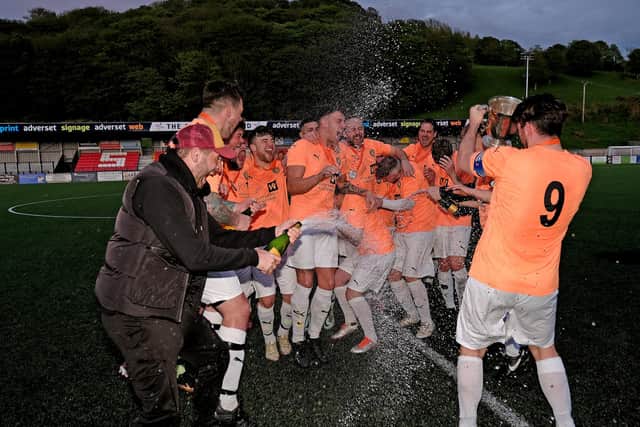 Edgehill celebrate winning their fifth and final trophy of the 2022-23 season, the District FA Cup, after beating Whitby Fishermen. Photo by Richard Ponter.