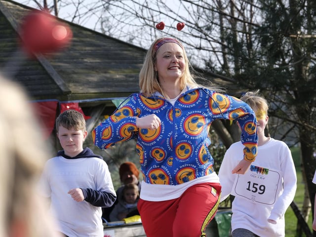 Mrs Sweeney-Chisholm leads the warm up