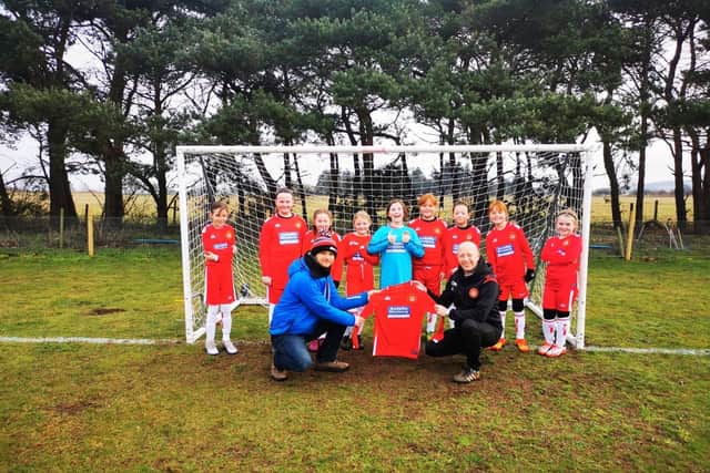 Under 10s receiving their new kit from Stuart Lincoln of Autofix Motors on Depot Lane, Scarborough. www.autofixmotors.co.uk