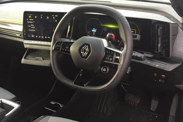 The interior is comfortable and fitted out with a baker’s dozen of places for storage