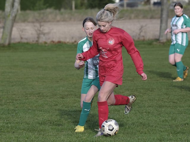 A Scarborough Ladies player pushes on