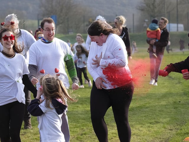 Clouds of colour flew across the school fields