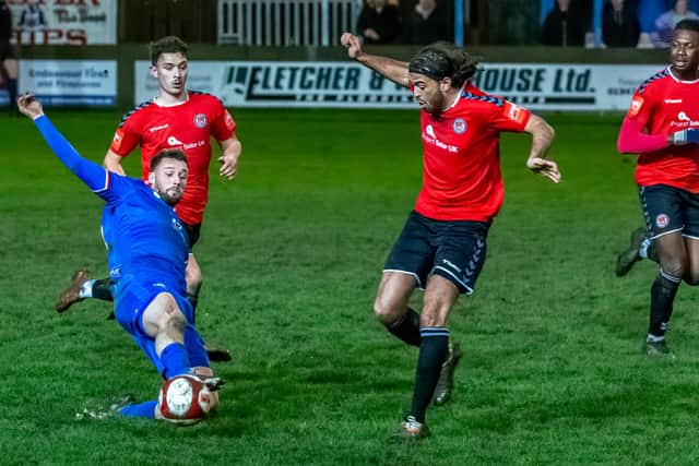 Lewis Hawkins put Whitby Town 1-0 ahead at Warrington Town on Tuesday evening, the Blues ended up battling back for a 2-2 draw despite playing nearly an hour with 10 men