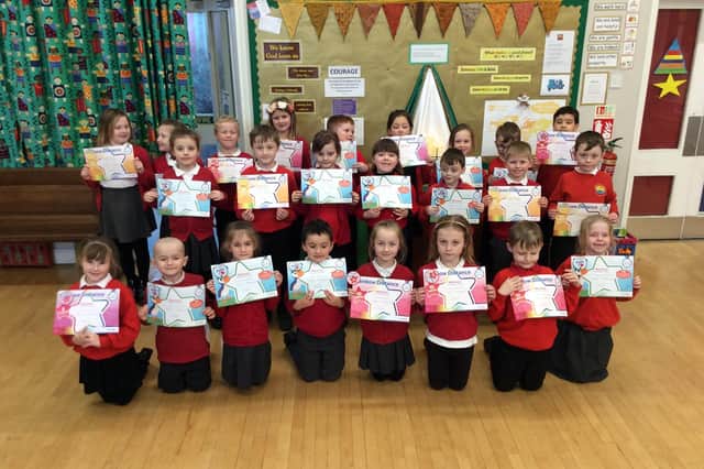 Mrs Mackay's Year Two pupils at Filey Infact School celebrate their swimming success