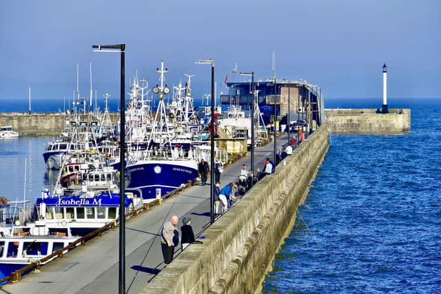 Aled Jones focuses on a busy South Pier in the sun.