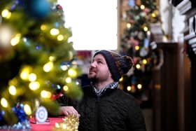 St Mary's Christmas Tree exhibition in Whitby - Shaun Clifford views the trees.
picture by Richard Ponter.
