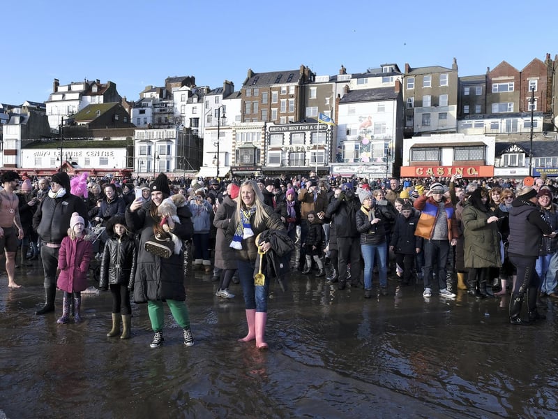 A large crowd gathered on the shoreline