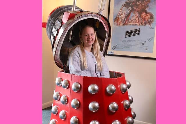 Saleroom assistant Grace McLean prepares to exterminate.