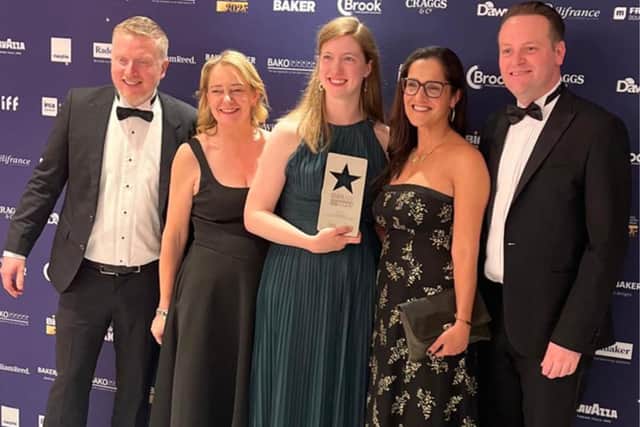 Emily Anderson with her award