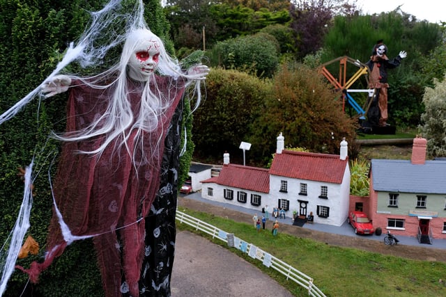 Scary decorations can be found all around the tiny structures.