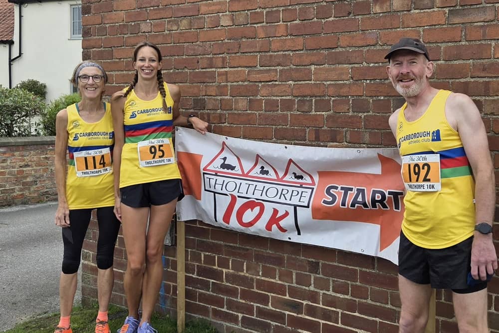 Sue Haslam, second from left, and Anna Giddings earned county 10K titles, with Simon Neal the third Scarborough AC athlete in action at The Tholthorpe 10K.