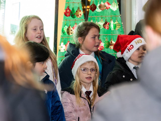 The students in front of their 'advent' window
