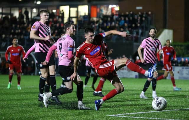 Boro skipper Will Thornton is at full stretch to reach the ball in the loss at home to Curzon Ashton. PHOTOS: ZACH FORSTER