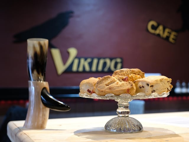 The cafe's current opening hours are Monday to Friday, nine - four, and Saturday ten - three.