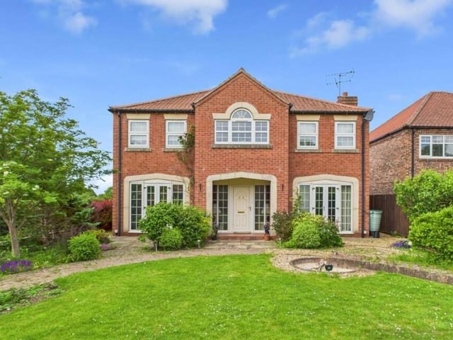 The impressive front view of the property for sale in the village of Carnaby.