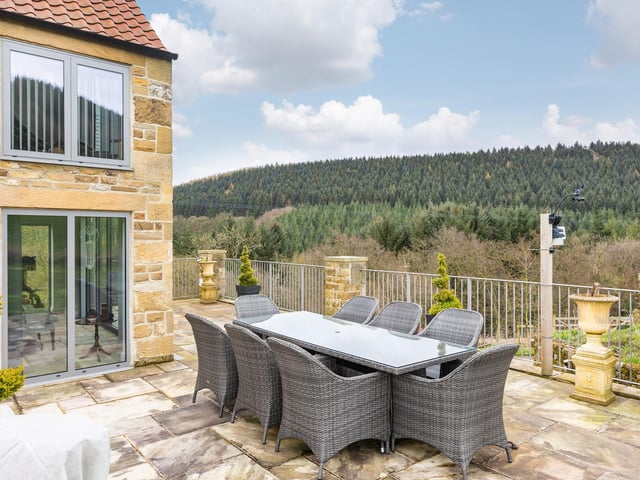 Al fresco dining with a view - one of the outdoor seating areas to take advantage of the surrounding scenery.