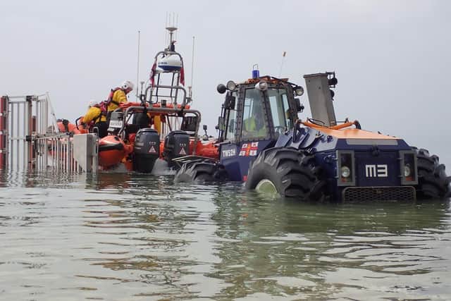 Flamborough lifeboat crew rescue swimmer swept out to sea at Thornwick Bay
