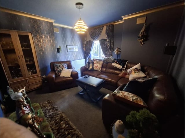 A fourth bedroom is currently used as a cinema room.
