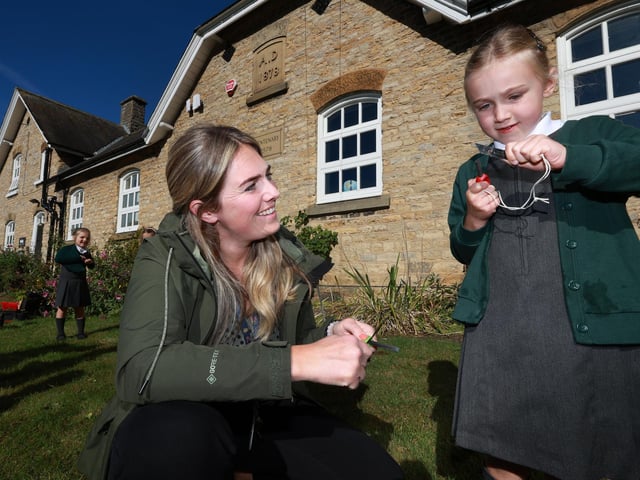 Learning bushcraft skills with teacher Megan Watts