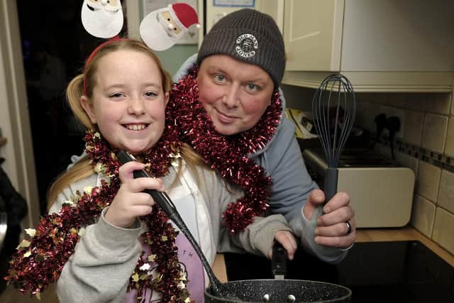 Lily with dad Graham Porter in the kitchen