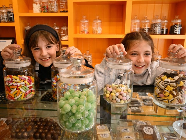 Betsy and Bo in Staithes selling sweets. photo: Richard Ponter