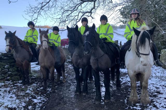 Fyling Hall students horse-riding in the snow.