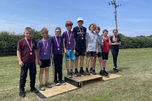 The top nine points scorers in the school cycling event at Oakridge.