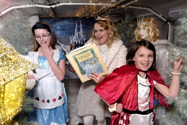 Shannon Rewcroft reads a story and meets some Gladstone Road pupils on the Narnia bus.
picture: Richard Ponter