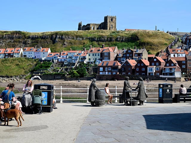 Visitors having a break and taking in the spectacular views.