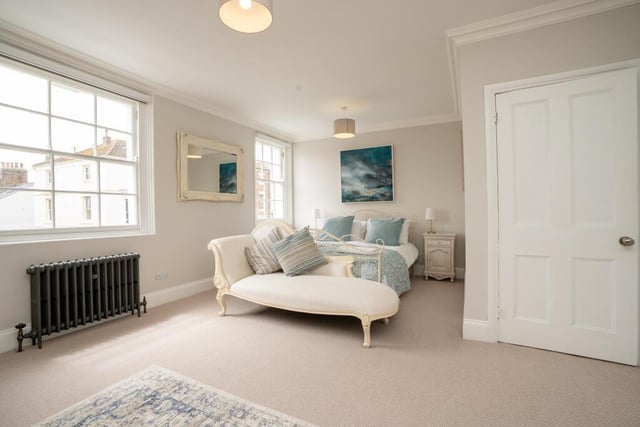 One of the light and spacious bedrooms in the townhouse.