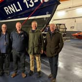 Si Loveland, Mick Cowper, Roger Buxton, James Lambert OBE and Lifeboat Station President, John Senior MBE. (Photo: Scarborough RNLI)