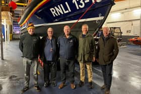 Si Loveland, Mick Cowper, Roger Buxton, James Lambert OBE and Lifeboat Station President, John Senior MBE. (Photo: Scarborough RNLI)