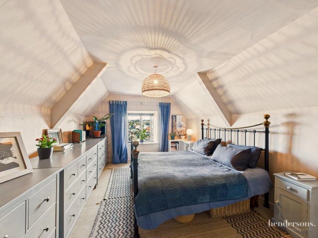 A lovely upper floor bedroom.