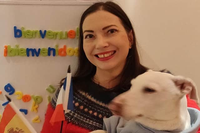 Alison and her dog Milo in her classroom in Scarborough