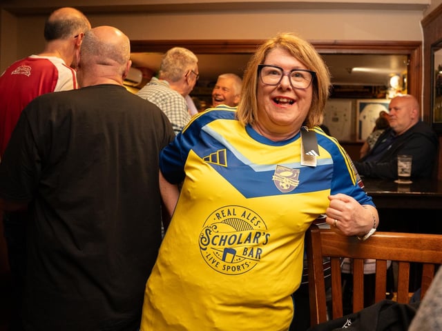 Another Seadogs fan shows off her new away team shirt.