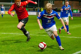 Max Howells has extended his loan at Whitby Town.