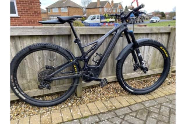 The black specialized full suspension electric mountain bike taken in garage burglary in Scarborough